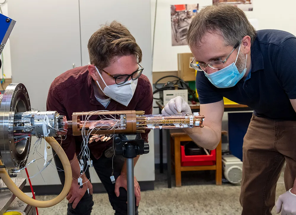 Cooling a particle from a trap away