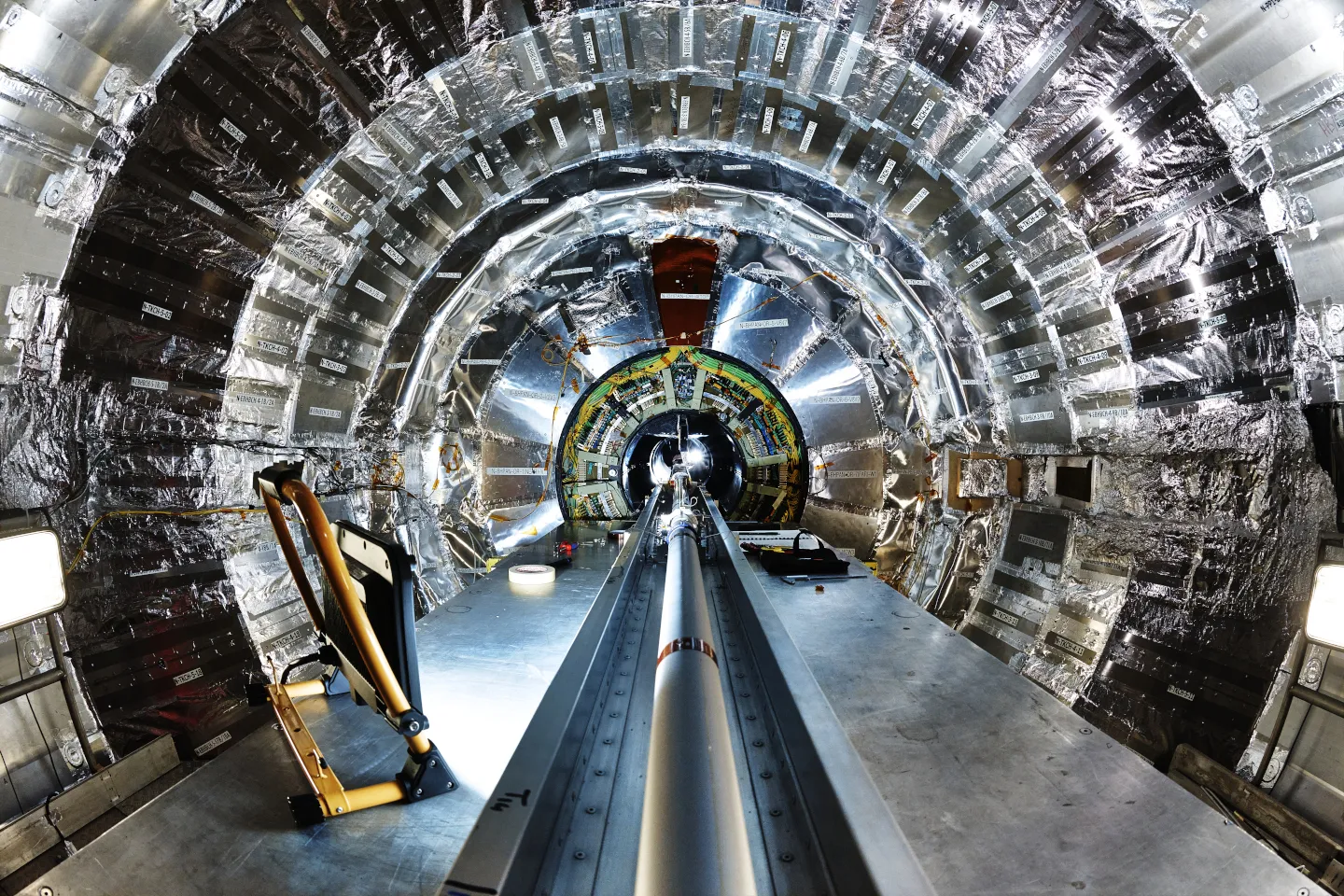 The installation of the beam pipe at the heart of the CMS experiment