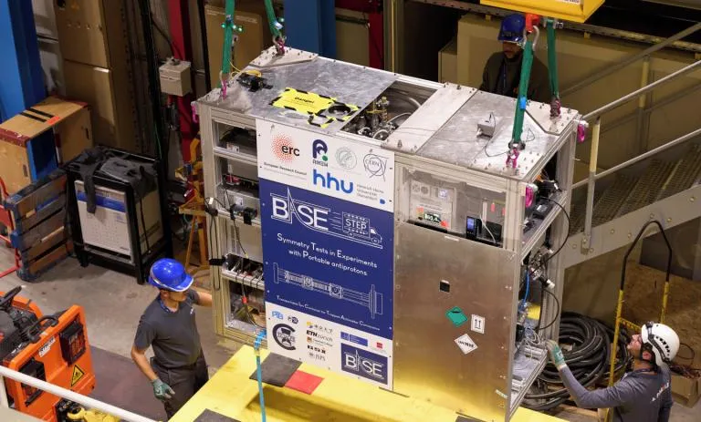 Moving antimatter beyond the lab
