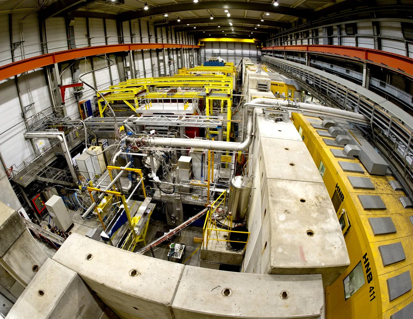 From COMPASS to AMBER: exploring fundamental properties of hadrons
