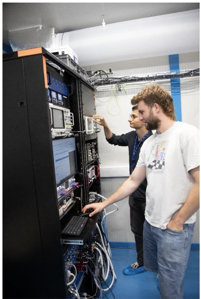 antimatter optical link CERN